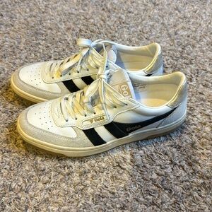 Women’s Gola size 6.  White with navy and gold detail.  Almost new! Run big.